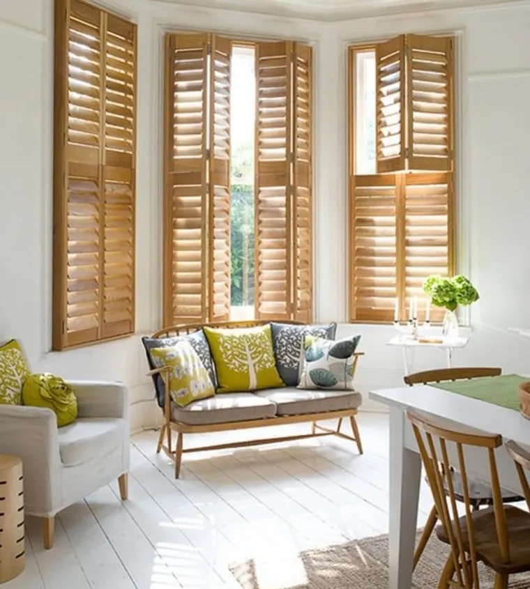 Natural wood finish on interior residential plantation shutters